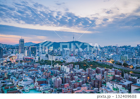 Seoul's Namsan Tower and its surrounding cityscape during the autumn day Seoul's Namsan Tower and its surrounding cityscape during the autumn day 132409688