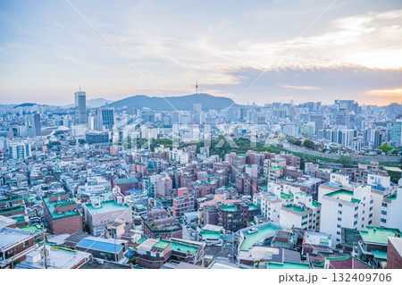Seoul's Namsan Tower and its surrounding cityscape during the autumn day Seoul's Namsan Tower and its surrounding cityscape during the autumn day 132409706