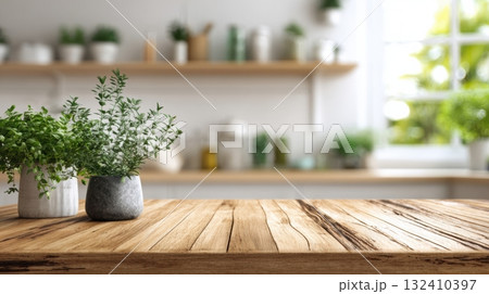 Fresh herbs in ceramic pots on a wooden kitchen table Fresh herbs in ceramic pots on a wooden kitchen table 132410397