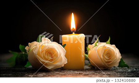 Beautiful white roses and candle on table against black background. Funeral symbol. Burning candle placed between two white roses dark surface, symbolizing remembrance. Beautiful white roses and candle on table against black background. Funeral symbol. Burning candle placed between two white roses dark surface, symbolizing remembrance. 132410880