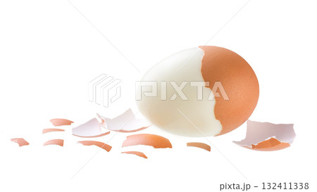 Peeled boiled egg with eggshell isolated on a white background. 132411338