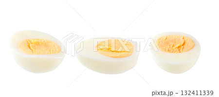 Half of a boiled chicken egg isolated on a white background. 132411339