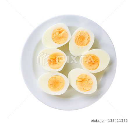 Boiled chicken eggs in a ceramic plate isolated on a white background, top view. 132411353