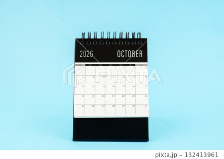October 2026 Monthly desk calendar for 2026 year on blue background. 132413961
