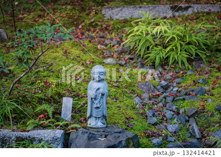 Jizo Buddist with rosary at garden of Nisonin temple, Arashiyama Jizo Buddist with rosary at garden of Nisonin temple, Arashiyama 132414421