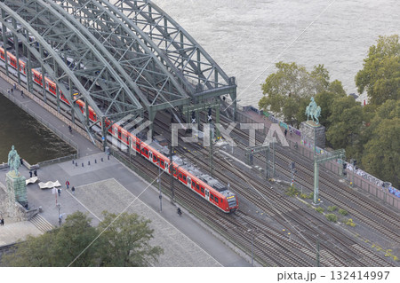 Hohenzollern Bridge in the evening and moving train Hohenzollern Bridge in the evening and moving train 132414997