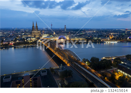 Evening view of Cologne Cathedral and Hohenzollern Bridge in the sunset 132415014