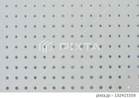 Pattern of metallic circles on white paper background 132415359