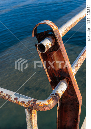 Old pier in the harbor bay near the village of Roda on the island of Corfu 132415834
