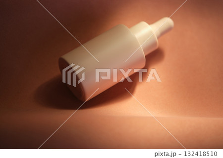 Bottles of facial serum in the soft sunset light. 132418510