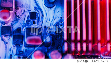 Ink flow. Digital hardware. Defocused blue red pink colorful glitter water electronic motherboard microchip on abstract art neon background. 132418785