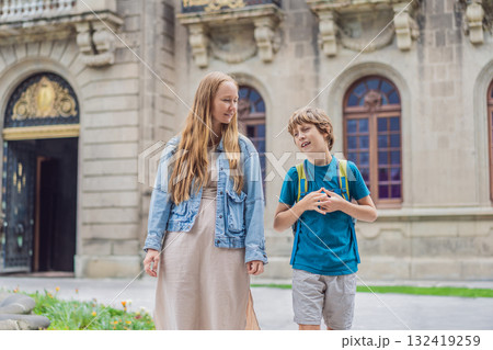 Mother and her teenage son visiting Chapultepec Castle in Mexico City, enjoying sightseeing and family travel. Cultural heritage and tourism concept Mother and her teenage son visiting Chapultepec Castle in Mexico City, enjoying sightseeing and family travel. Cultural heritage and tourism concept 132419259