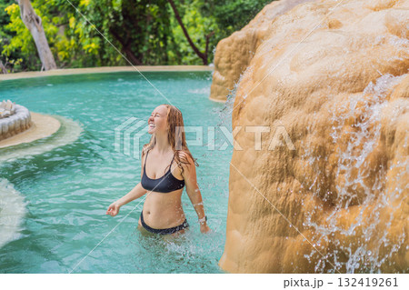 Female tourist exploring Grutas Tolantongo in Mexico, enjoying natural hot springs, scenic caves, and outdoor adventure. Travel, wellness, and sightseeing concept Female tourist exploring Grutas Tolantongo in Mexico, enjoying natural hot springs, scenic caves, and outdoor adventure. Travel, wellness, and sightseeing concept 132419261