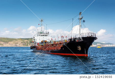 Ship, industrial bulk carrier tanker anchored in sea. Ship, industrial bulk carrier tanker anchored in sea. 132419698