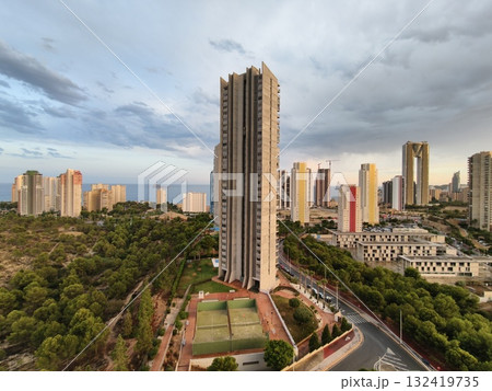 tranquil cityscape scene, serene urban environment featuring skyscrapers and natural surroundings 132419735