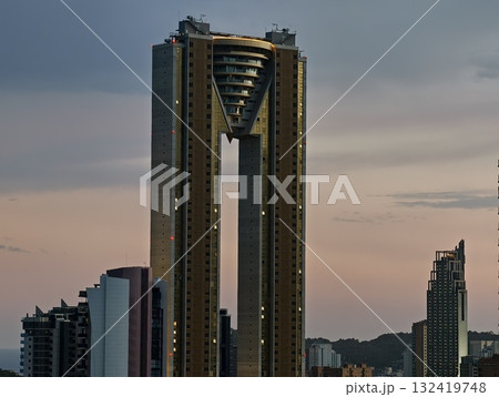 symmetrical tower with bold geometric features, balance of negative space and symmetry in structure 132419748