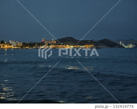 vibrant city nightlife, energetic city coastal nightlife featuring illuminated buildings vibrant city nightlife, energetic city coastal nightlife featuring illuminated buildings 132419778