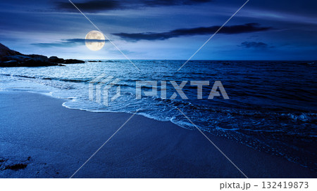 panoramic view of sand beach landscape at night. summer vacation season at the black sea in full moon light. beautiful seaside with calm water. wide coast travel banner panoramic view of sand beach landscape at night. summer vacation season at the black sea in full moon light. beautiful seaside with calm water. wide coast travel banner 132419873