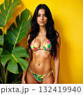 beautiful woman in a floral bikini 132419940