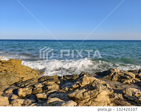 dynamic coastal surf with vibrant imagery, energetic seaside surf scene ideal for promotional 132420107