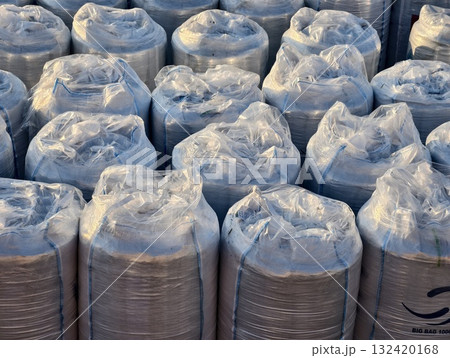 warehouse storing charcoal briquettes efficiently, industrial warehouse filled with prepared warehouse storing charcoal briquettes efficiently, industrial warehouse filled with prepared 132420168