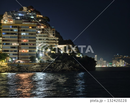 luxury coastal apartments, boutique cliffside resort capturing moonlit skyline and tranquil waters 132420228