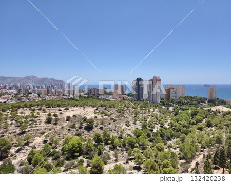 scenic coastal vista, hilltop view of coast, panoramic hilltop view of coast with skyline and sea 132420238