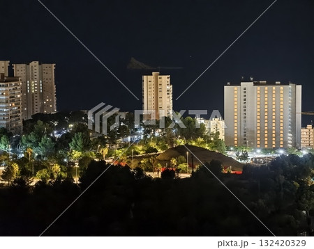 beautiful resort scene featuring glowing lights and relaxed leisure vibe for promotional use 132420329