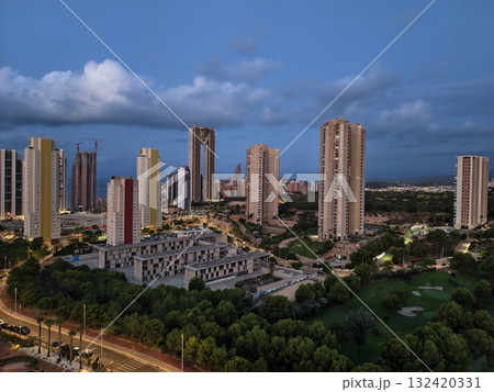 coastal evening scene, panoramic coastal cityscape featuring modern residences and gentle traffic coastal evening scene, panoramic coastal cityscape featuring modern residences and gentle traffic 132420331