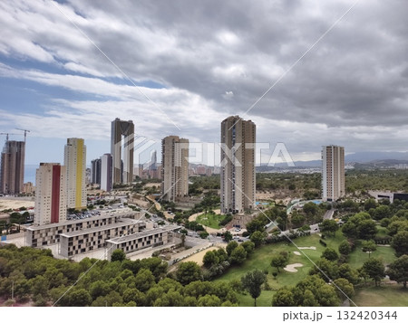 cityscape with greenery, expansive aerial view of city with tall buildings and green spaces cityscape with greenery, expansive aerial view of city with tall buildings and green spaces 132420344