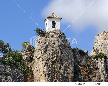 jagged cliff with scenic outlook, rugged bell tower atop cliff offering spectacular views 132420426