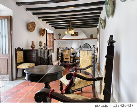 vintage spanish dining with warm accents, cozy spanishinspired dining room with antique furniture 132420437