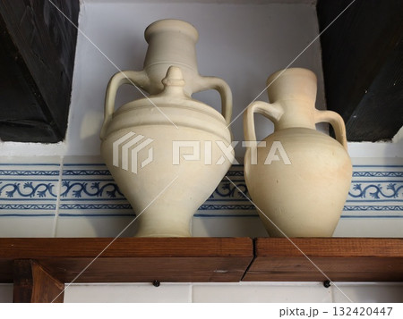 vintage ceramic set, antique ceramic collection displayed on rustic wooden market shelf scene vintage ceramic set, antique ceramic collection displayed on rustic wooden market shelf scene 132420447