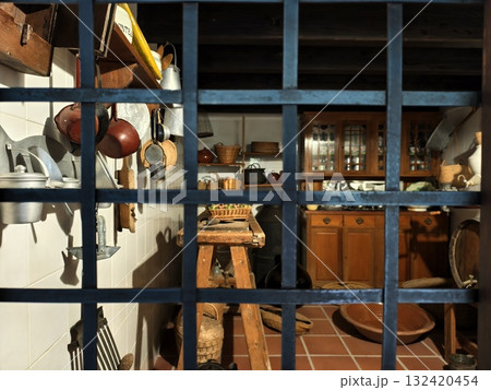 evoking nostalgic feelings in rustic kitchen setting with vintage heirloom cookware collection 132420454