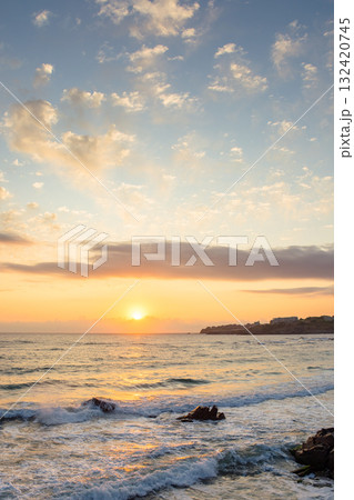 sea beach landscape at sunrise in summer. sun on the sky 132420745