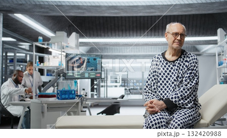 Portrait of old person waiting for drug testing in modern laboratory, wearing hospital robe and preparing for a clinical trial to obtain new treatment. Breakthrough in biomedicine. Camera A. 132420988