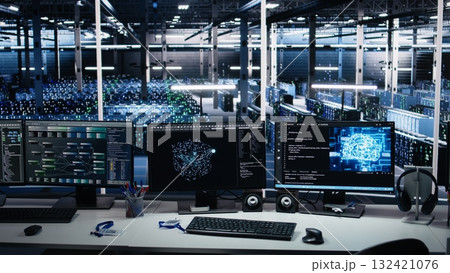 Data center PC screens monitoring backend hardware performance used in AI LLM model development and automation workloads. Workstation monitors overseeing server rigs equipment 132421076