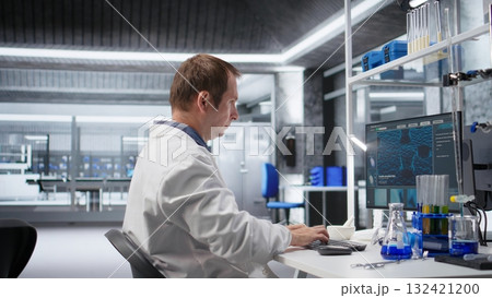 Chemist unable to comprehend results of clinical diagnostics, appears displeased and unsuccessful in laboratory workspace. The hard reality of science and advanced medical research. 132421200