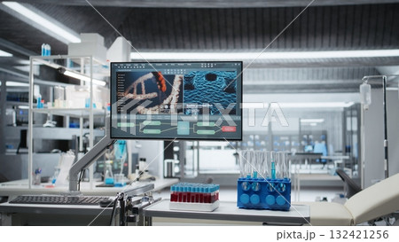 Empty lab filled with modern research equipment and computer screens ready for observation, testing and analysis. Symbolizing innovation and biotechnology development in healthcare and biomedicine. 132421256