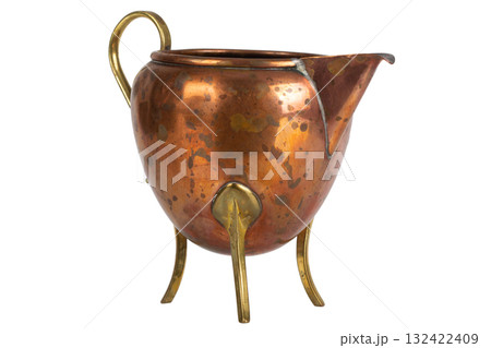 Vintage copper pitcher with tripod base. Vintage copper pitcher with tripod base. 132422409