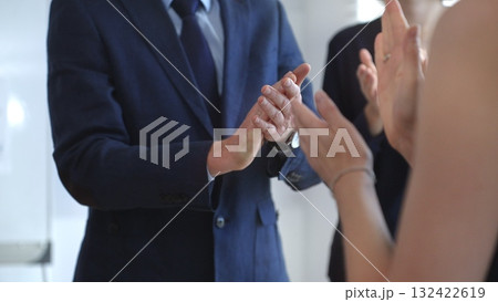 Business people hands clapping, showing applause and appreciation for success and achievement during a corporate event or conference meeting in bright office Business people hands clapping, showing applause and appreciation for success and achievement during a corporate event or conference meeting in bright office 132422619