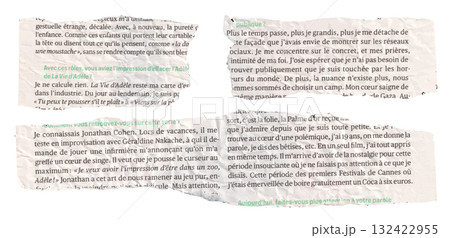 Torn French Newspaper Pieces Isolated on White Background Torn French Newspaper Pieces Isolated on White Background 132422955