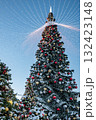 Christmas tree and New Year decorations on the town square on a frosty winter day. 132423148
