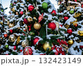 Christmas tree and New Year decorations on the town square on a frosty winter day. 132423149