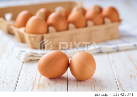 raw chicken eggs  on a white table, selective focus. 132423371