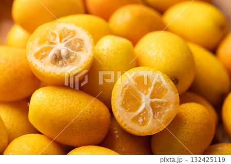 Fresh kumquats fruit texture background Fresh kumquats fruit texture background 132425119