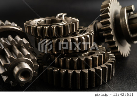 Gear and cogs wheels, clock mechanism, brass metal engine industrial. 132425611