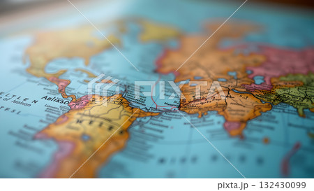 A detailed macro shot of a vintage world map showcasing the Middle East region and geopolitical 132430099