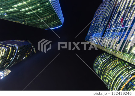Modern high glass skyscrapers in the night 132439246