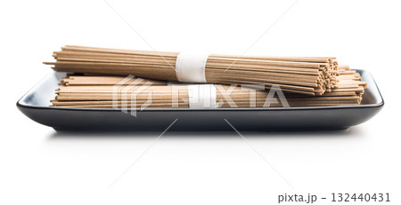Buckwheat soba noodles isolated on white background. Buckwheat soba noodles isolated on white background. 132440431